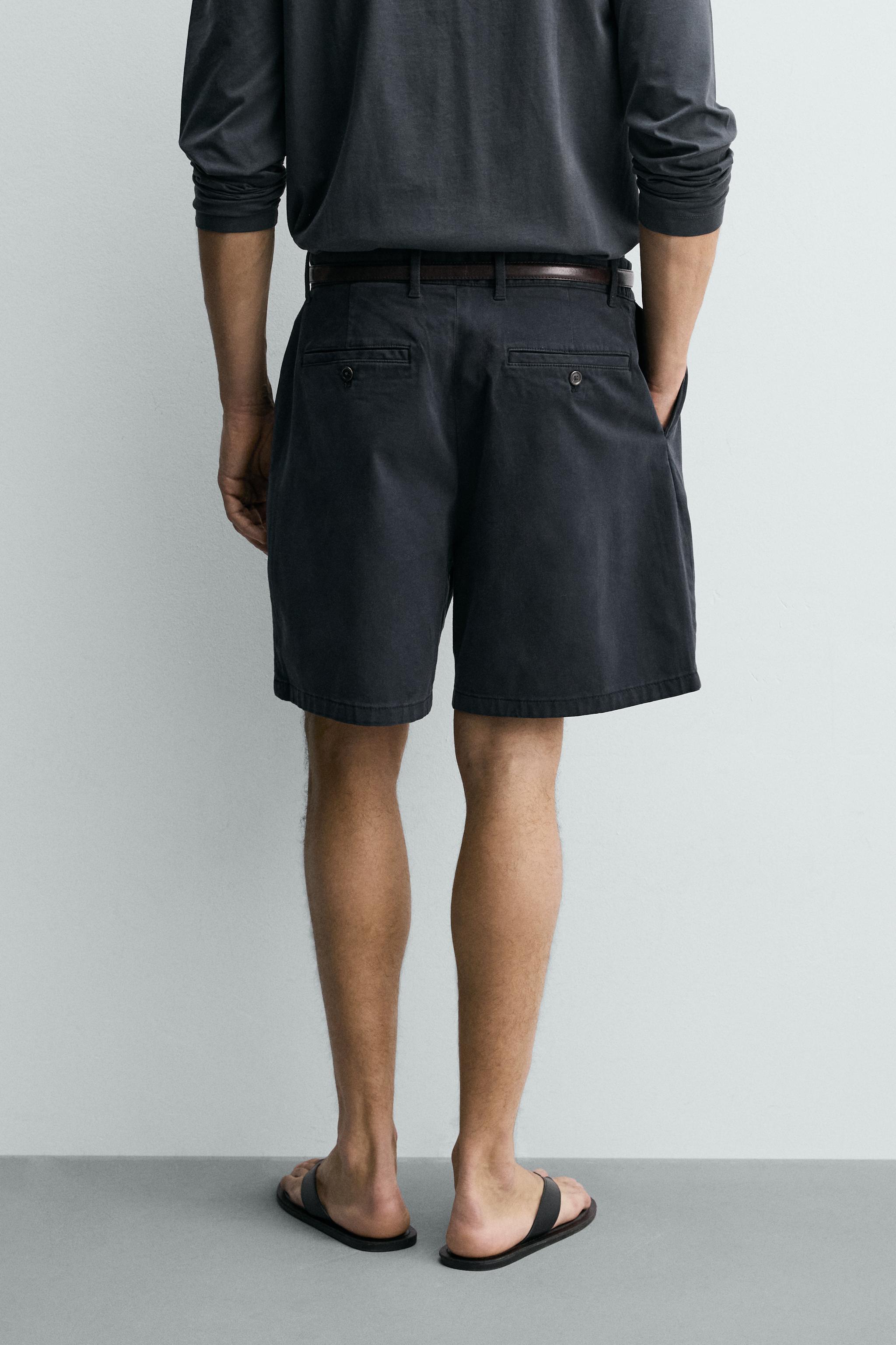 REGULAR FIT PLEATED CHINO SHORTS